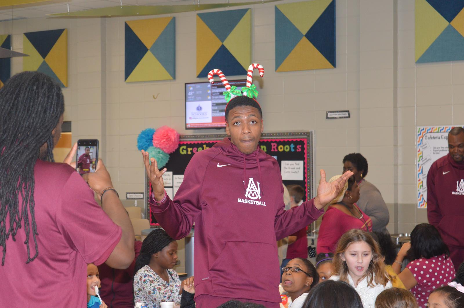 Alabama A&M men's basketball team visits local elementary school