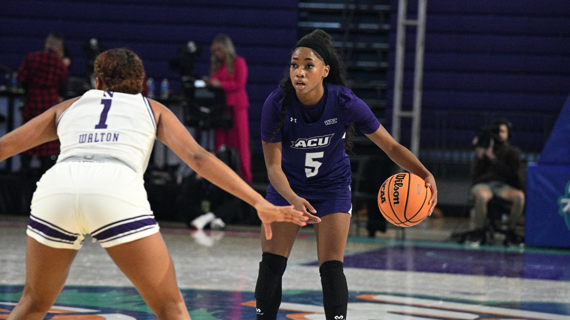 Breanna Davis scans the defense in ACU's 62-59 loss to Northwestern in Fort Myers, Fla. on Nov. 28, 2025.