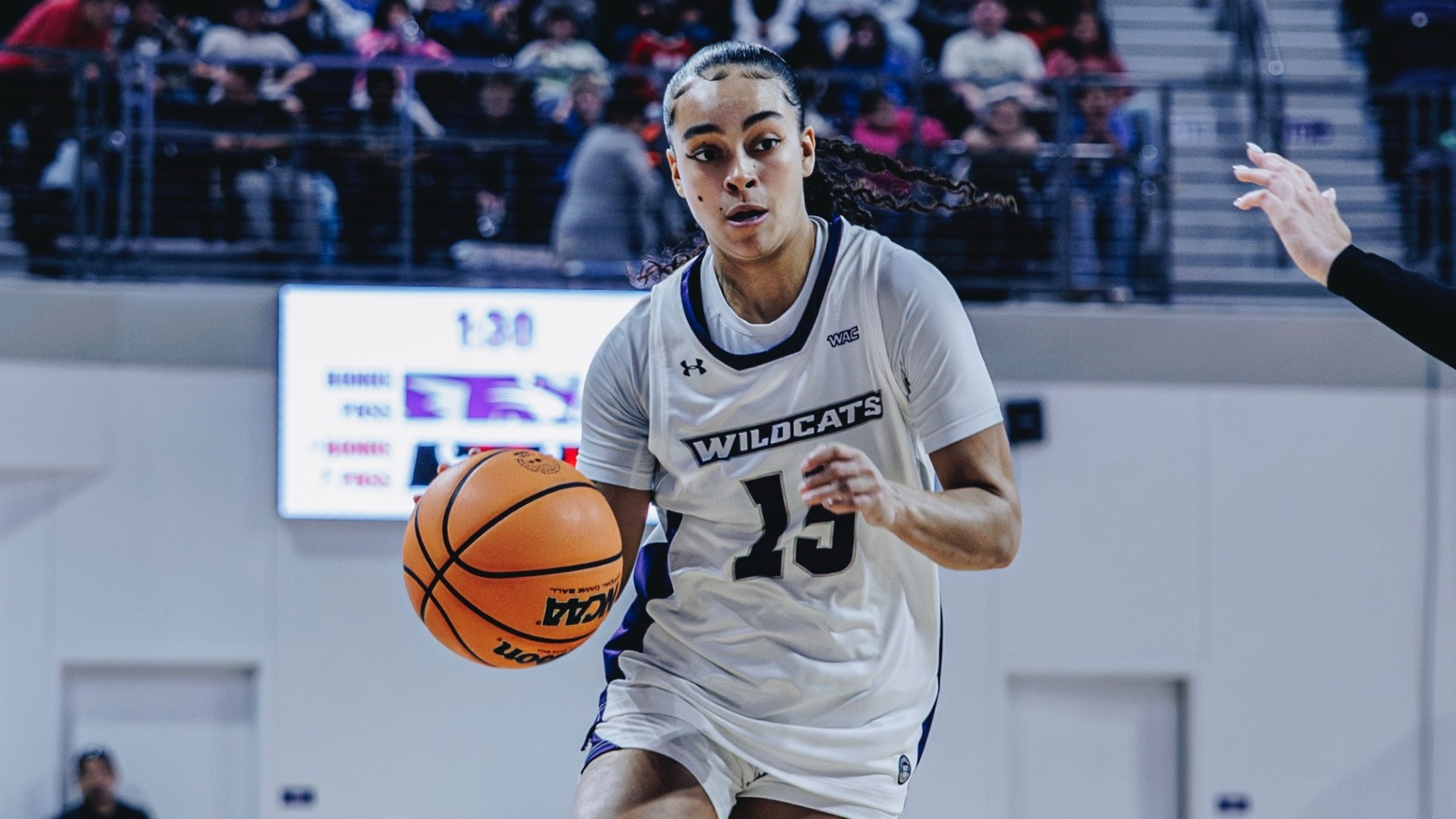 Jazmyn Stone dribbles the ball in ACU's 112-60 win over McMurry at Moody Coliseum on Dec. 2, 2025.