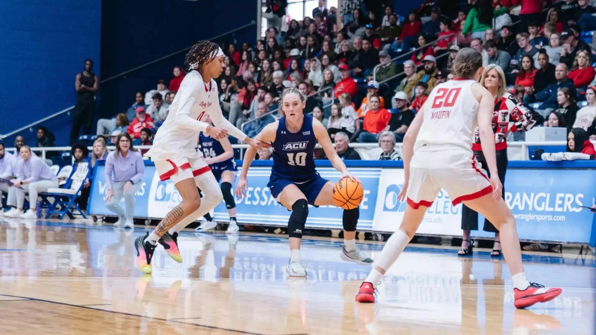 Payton Hull dribbles the ball in ACU's matchup with Texas Tech in Odessa, Texas on Dec. 14, 2025.