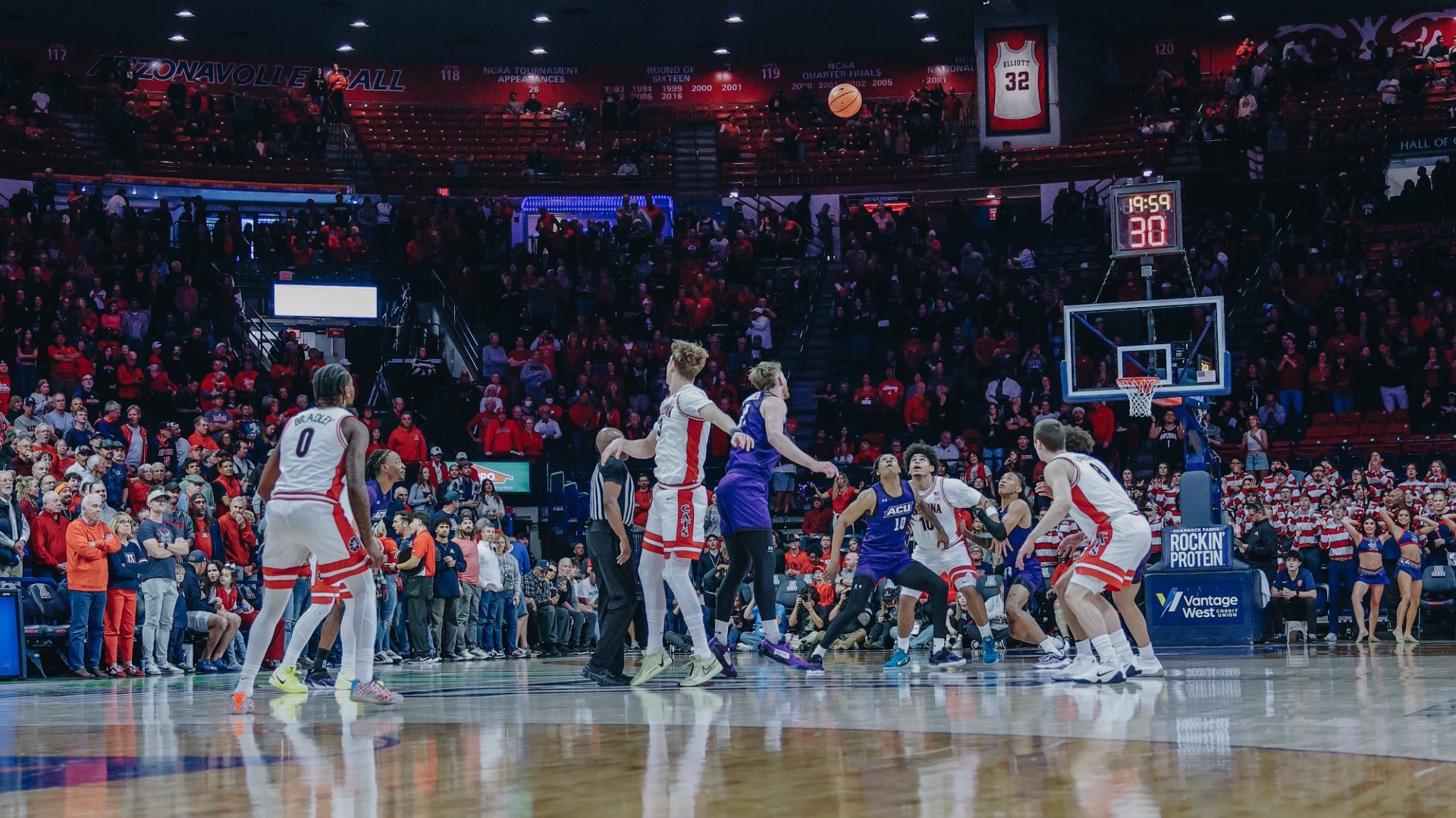 ACU fights for the opening tip against #1 Arizona on December 16, 2025