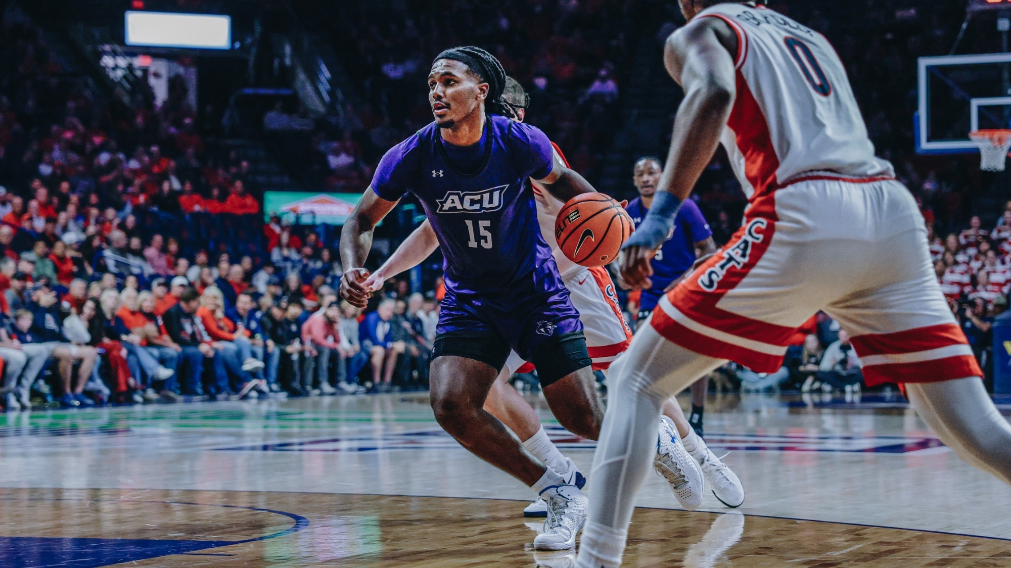 Bradyn Hubbard drives inside against No. 1 Arizona on December 16, 2025