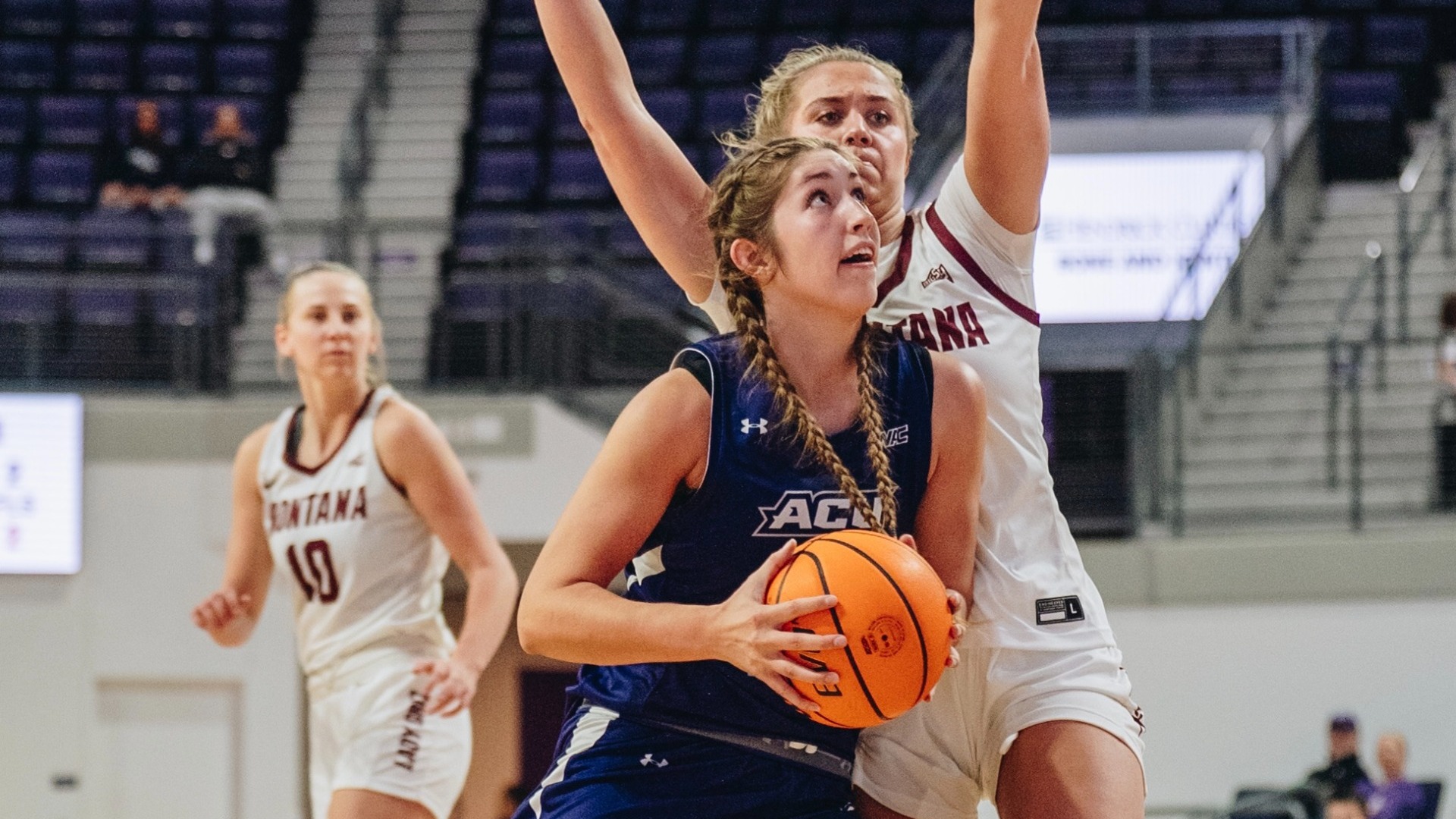 Meredith Mayes drives to the basket in ACU's 60-48 win over Montana at Moody Coliseum on Dec. 19, 2025.