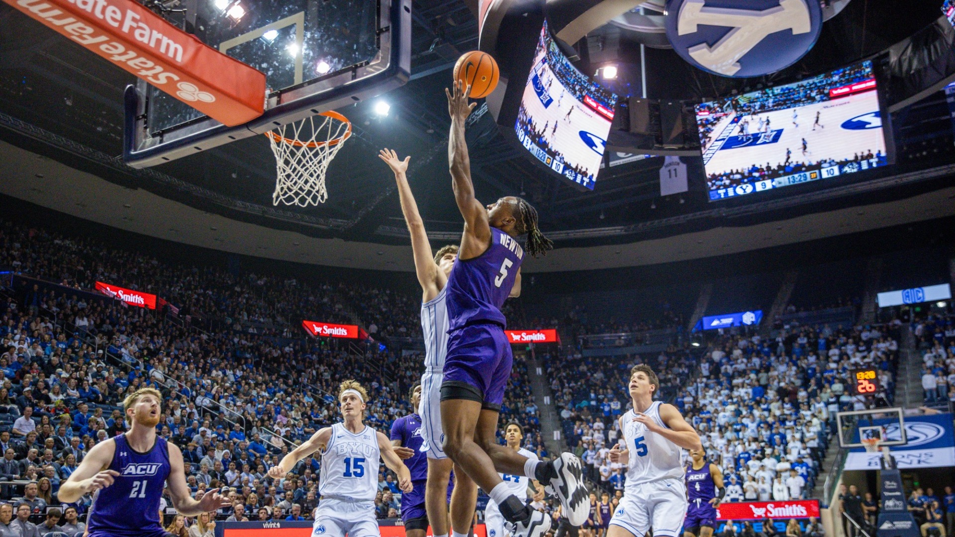 Cbo Newton jumps up to lift the ball to the basket at No. 10 BYU on December 19, 2025
