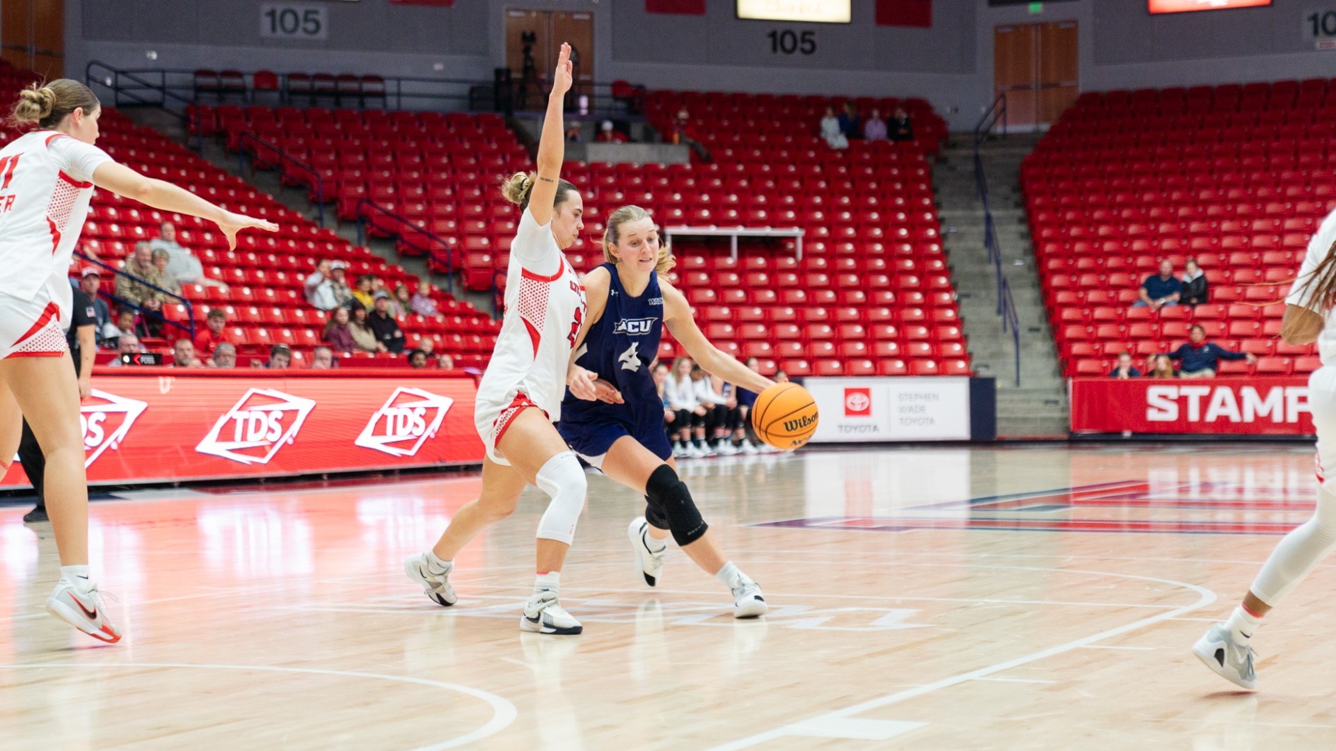 Erin Woodson drives to the basket in ACU's 81-51 win versus Utah Tech in St. George, Utah on Jan. 1, 2026.