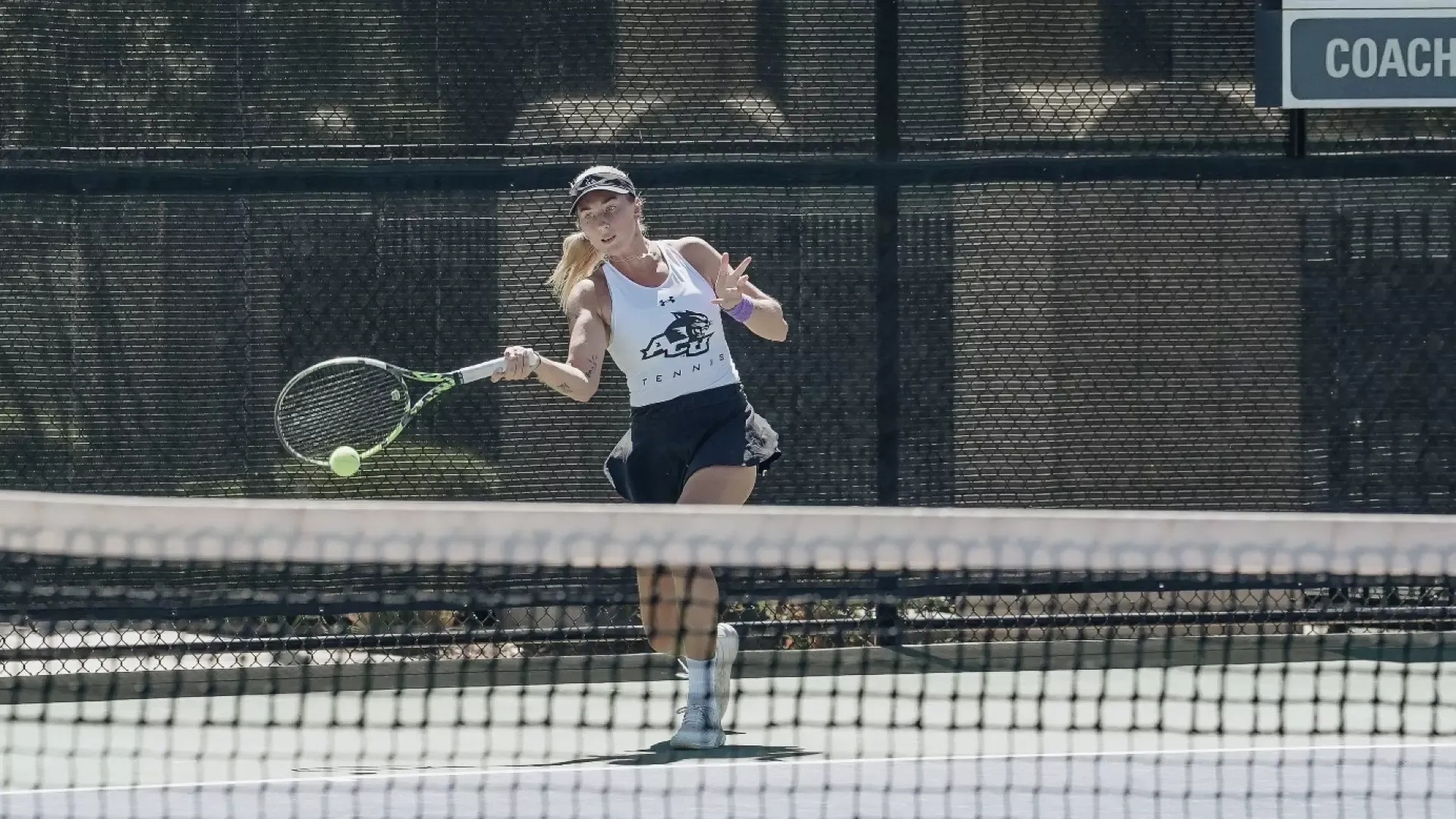 ACU women's tennis player hits ball during 2025 ACU Invite
