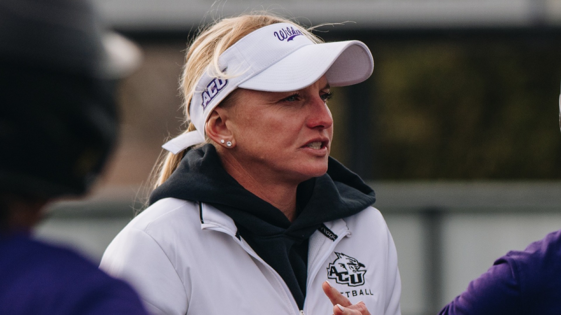 Jo Koons talks to her players during a practice on January 13, 2026 