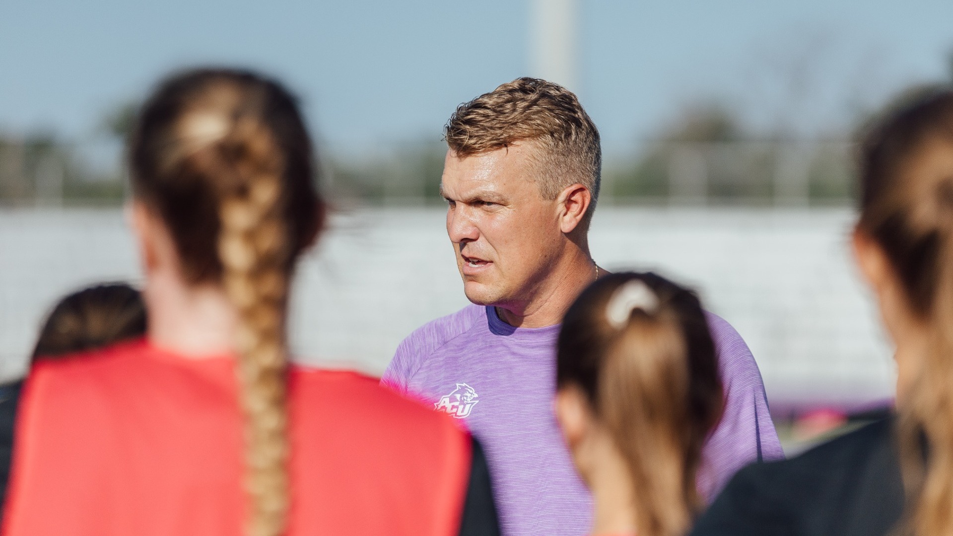 Stephen Salas speaks with the ACU soccer team during a practice at Elmer Gray Stadium on July 29, 2025.