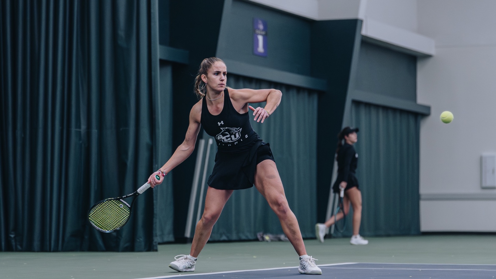 Maria Cascos prepares to hit the ball.