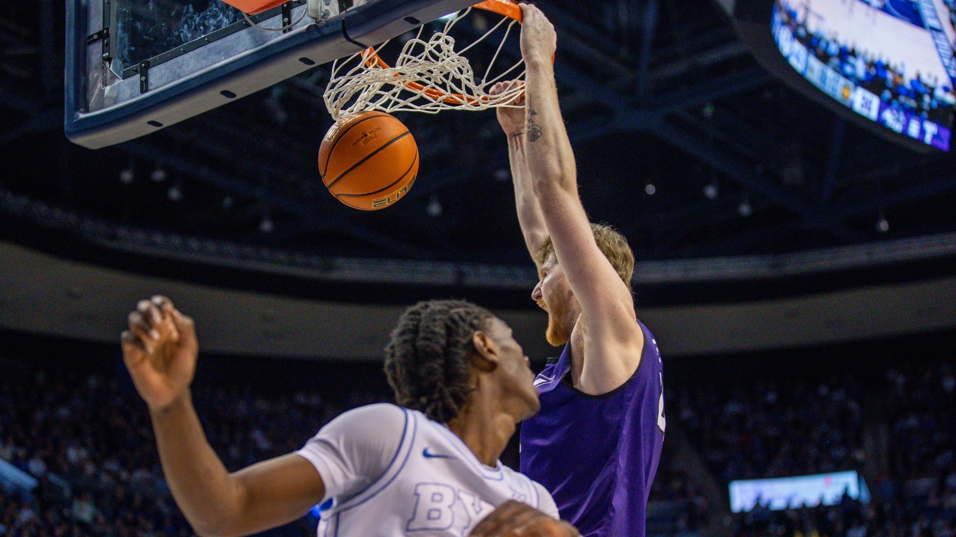 Cade Hornecker dunks against BYU on Dec. 19, 2025