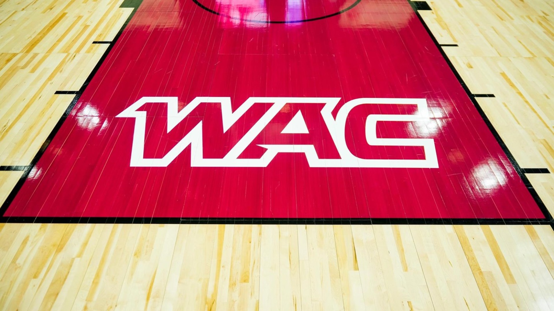 WAC logo on court at the WAC Basketball Tournament