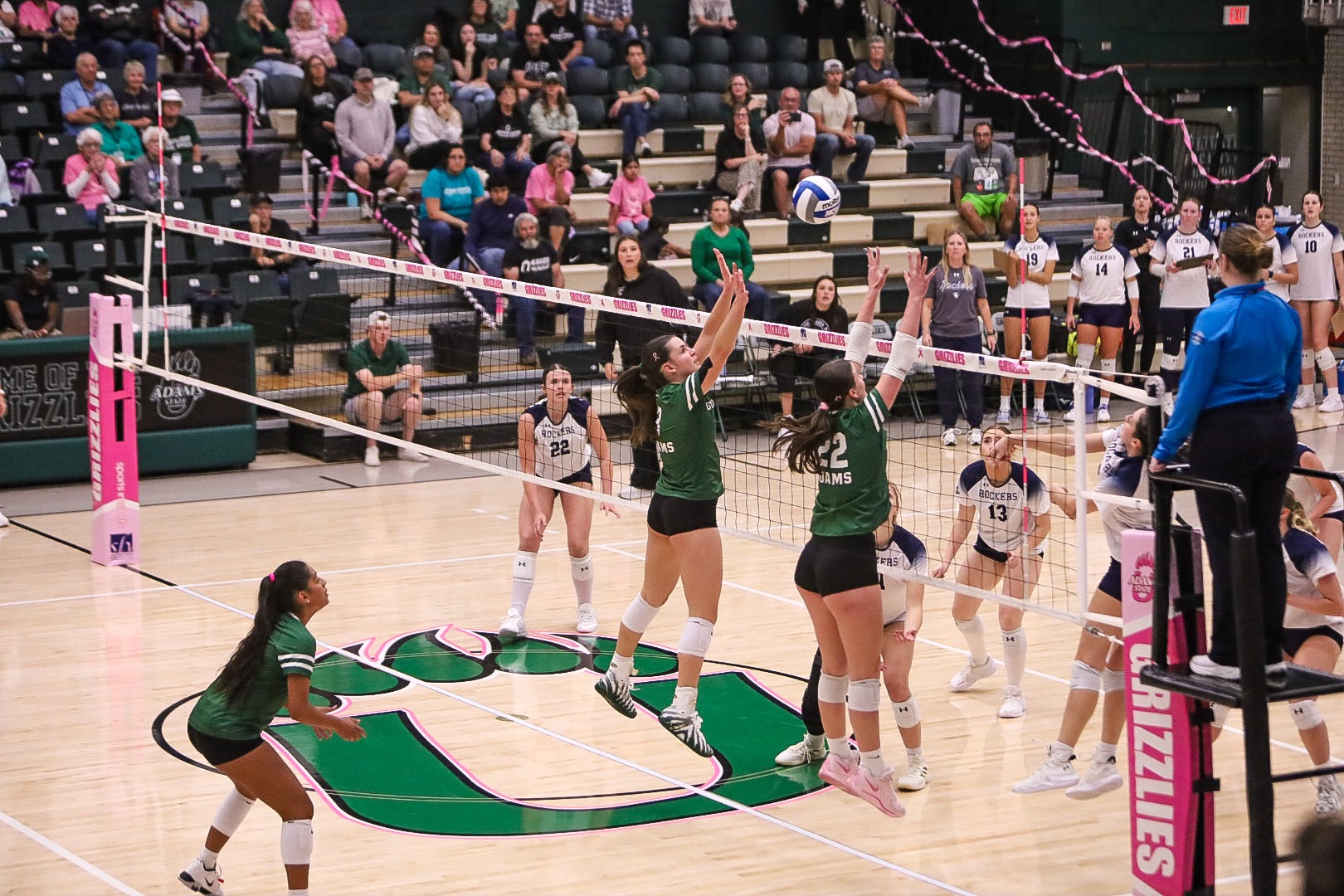 #3 Rowan Tribblehorn, #22 Lizzie Macintosh jump in the air for the block while #20 Isabella Delarosa awaits for the cover in the back in their matchup against South Dakota Mines on October 10, 2026