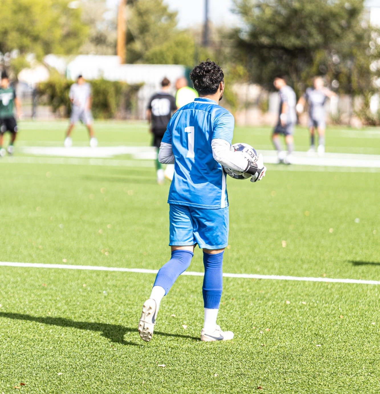 Goalie #1 Bryan Amezcua Gears up to Pass the Ball into play at Home
