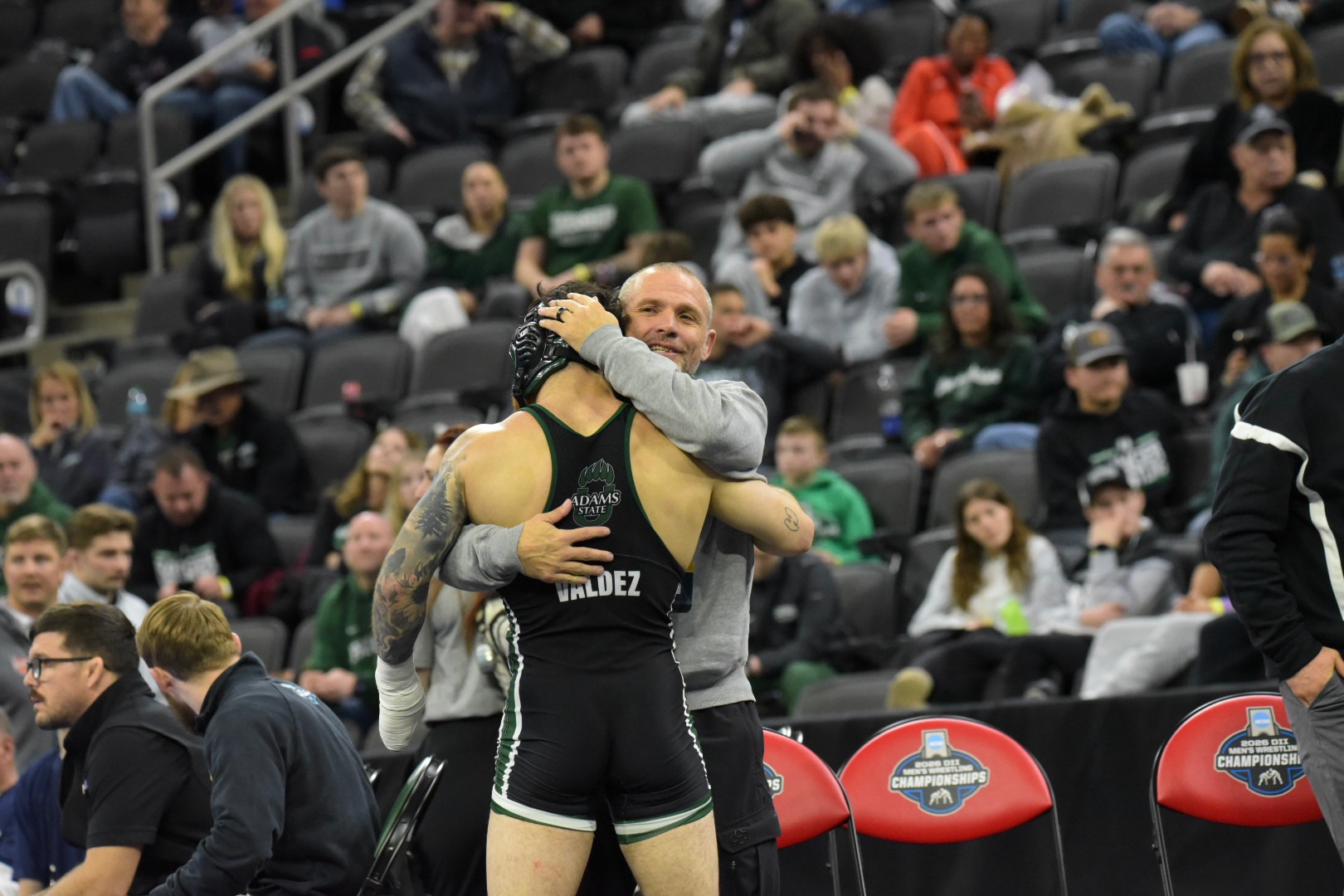Aaden hugging coach ram