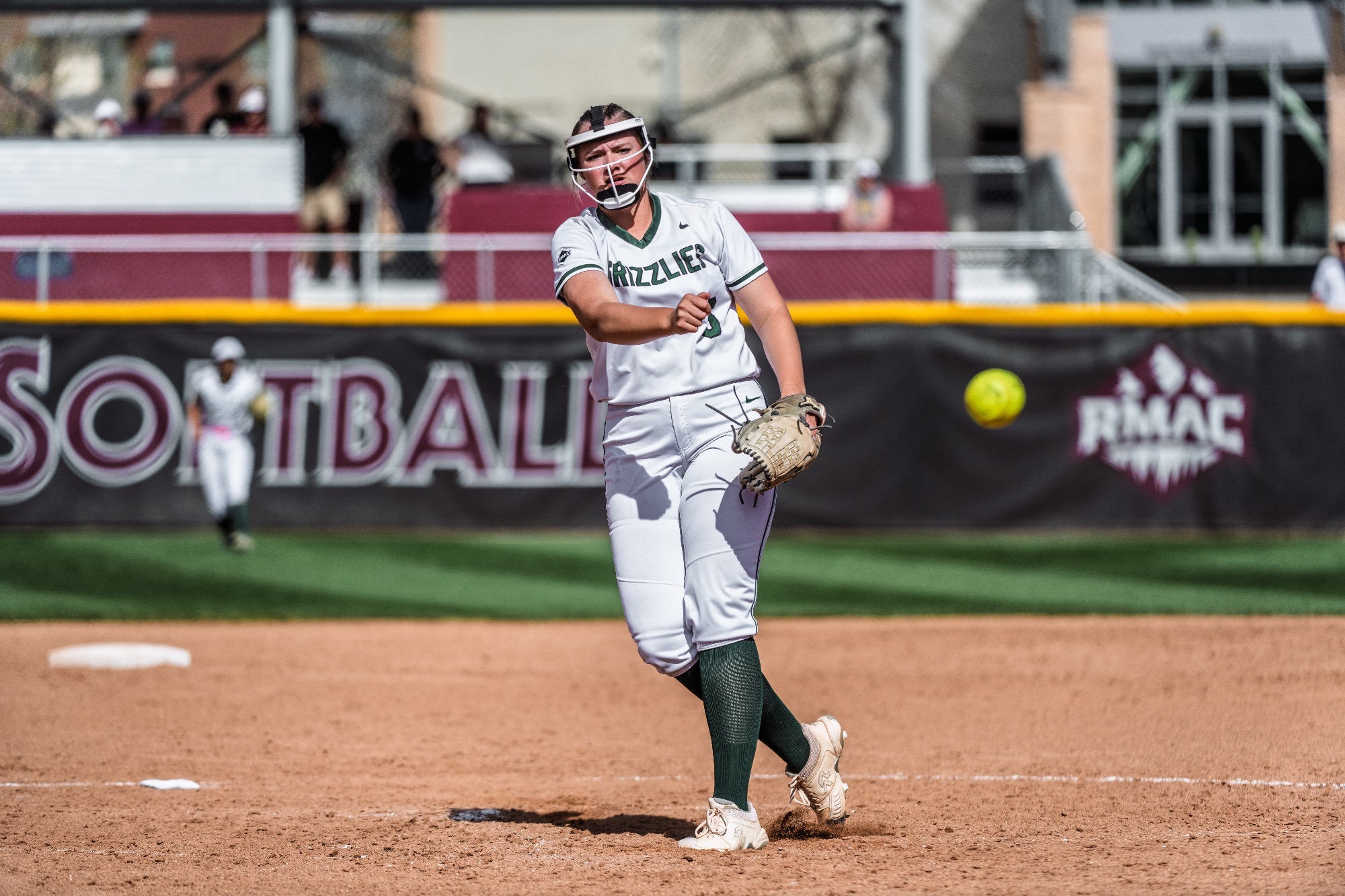 Jaklynn throwing a pitch at CMU