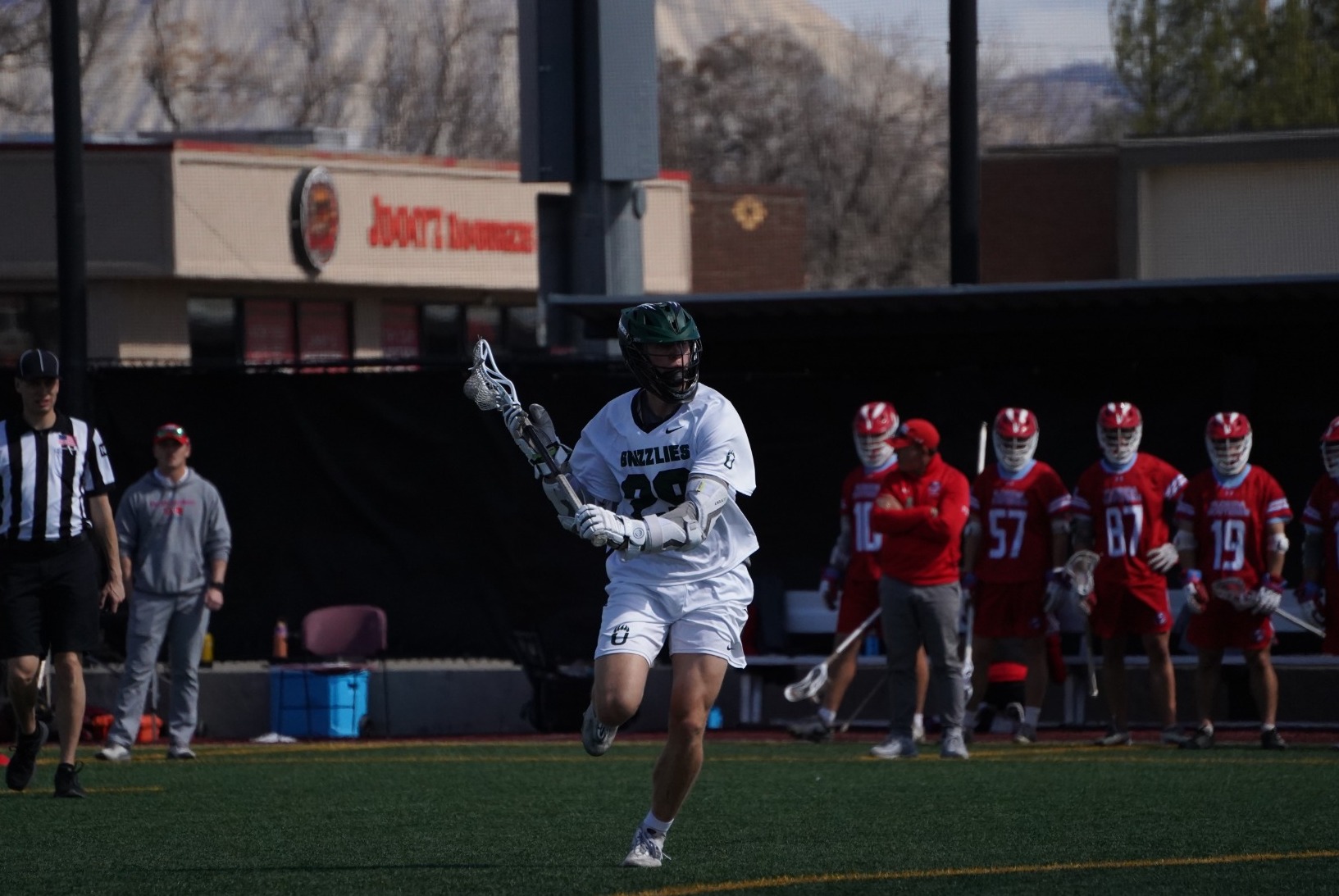 lacrosse player takes a shot