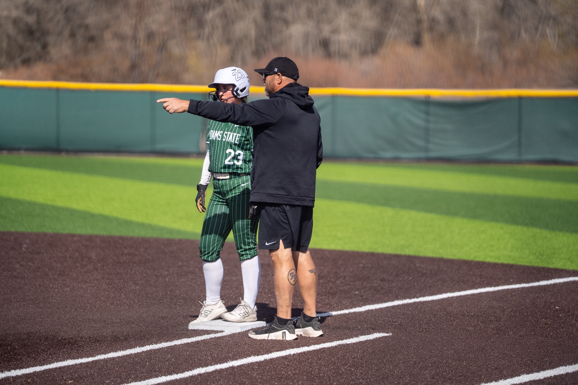 Coach Dane talking with Dean