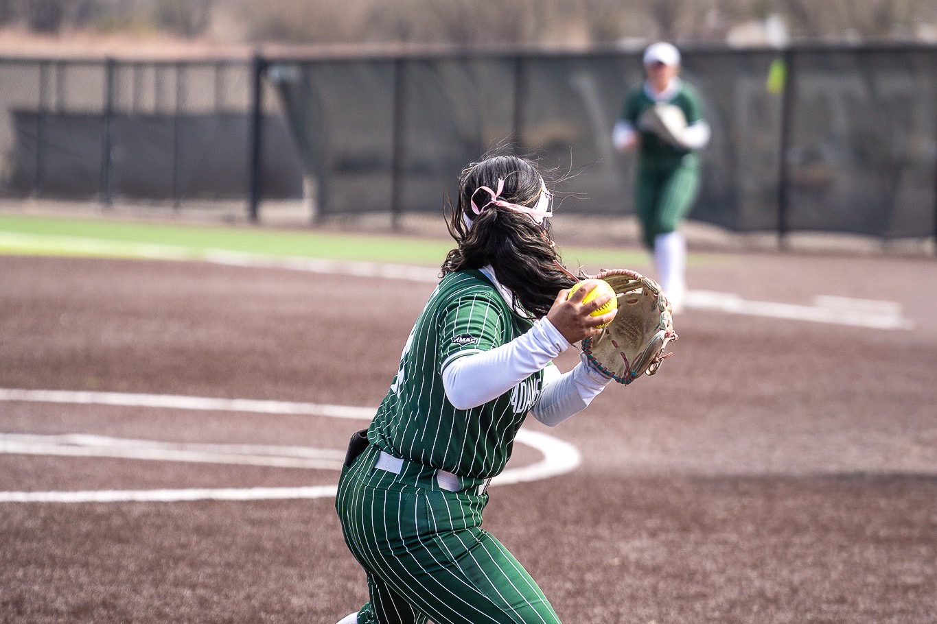 3B throwing the ball to 1B