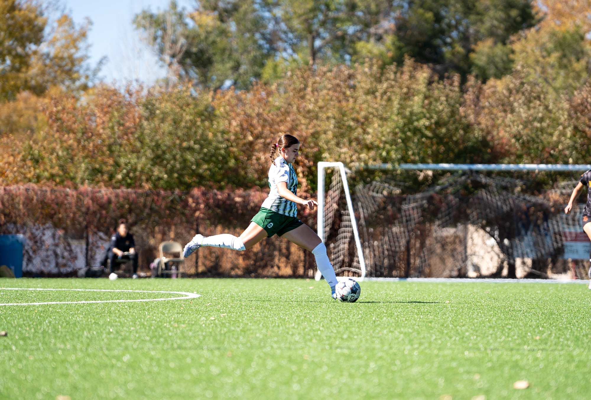 Ashlynn Mustain kicks ball: photo is for RMAC defensive Player of the Week press release 