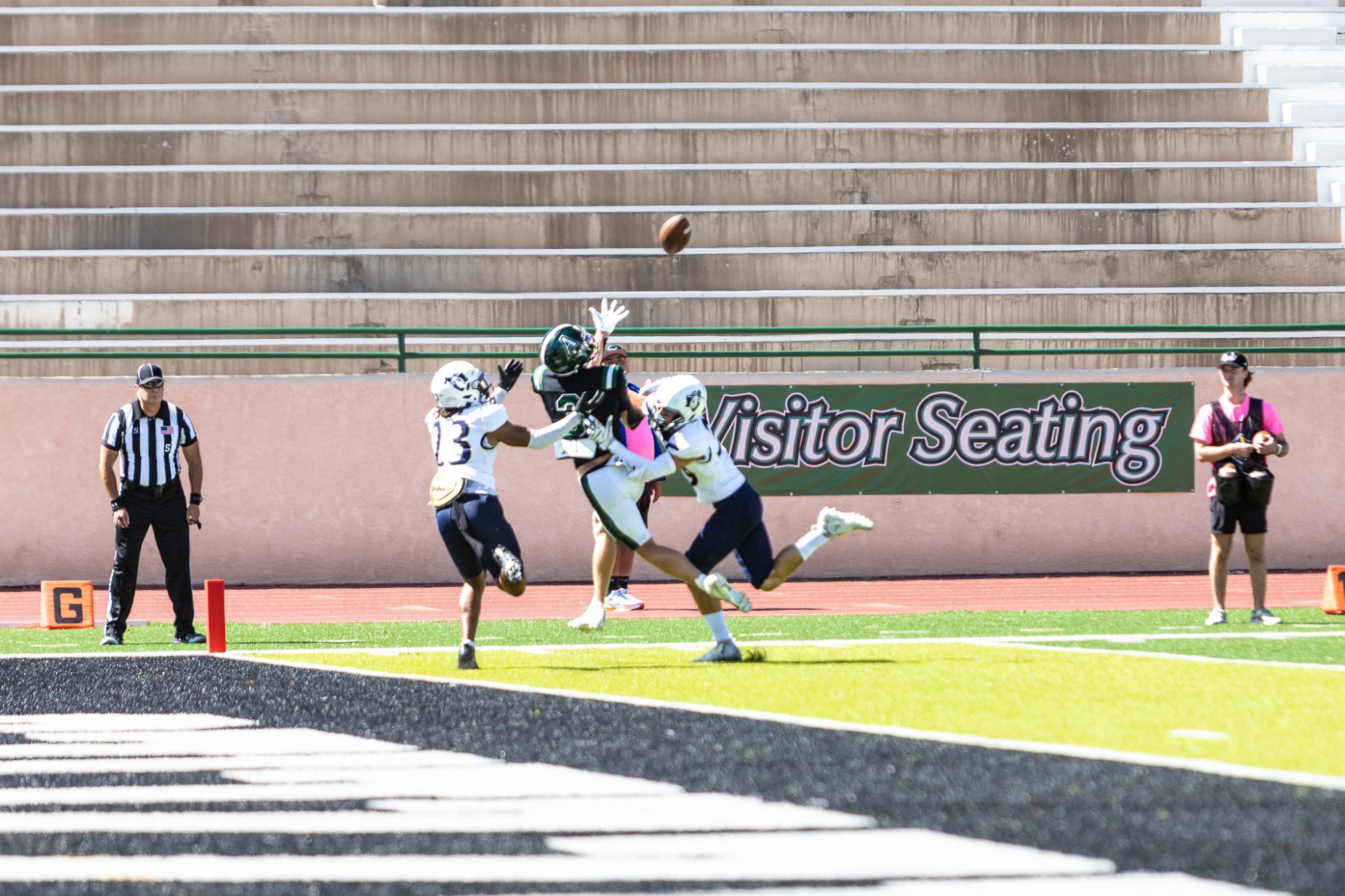 #26 Gabe Mcfarland reaches up to make the catch against South Dakota Mines on September 19, 2026