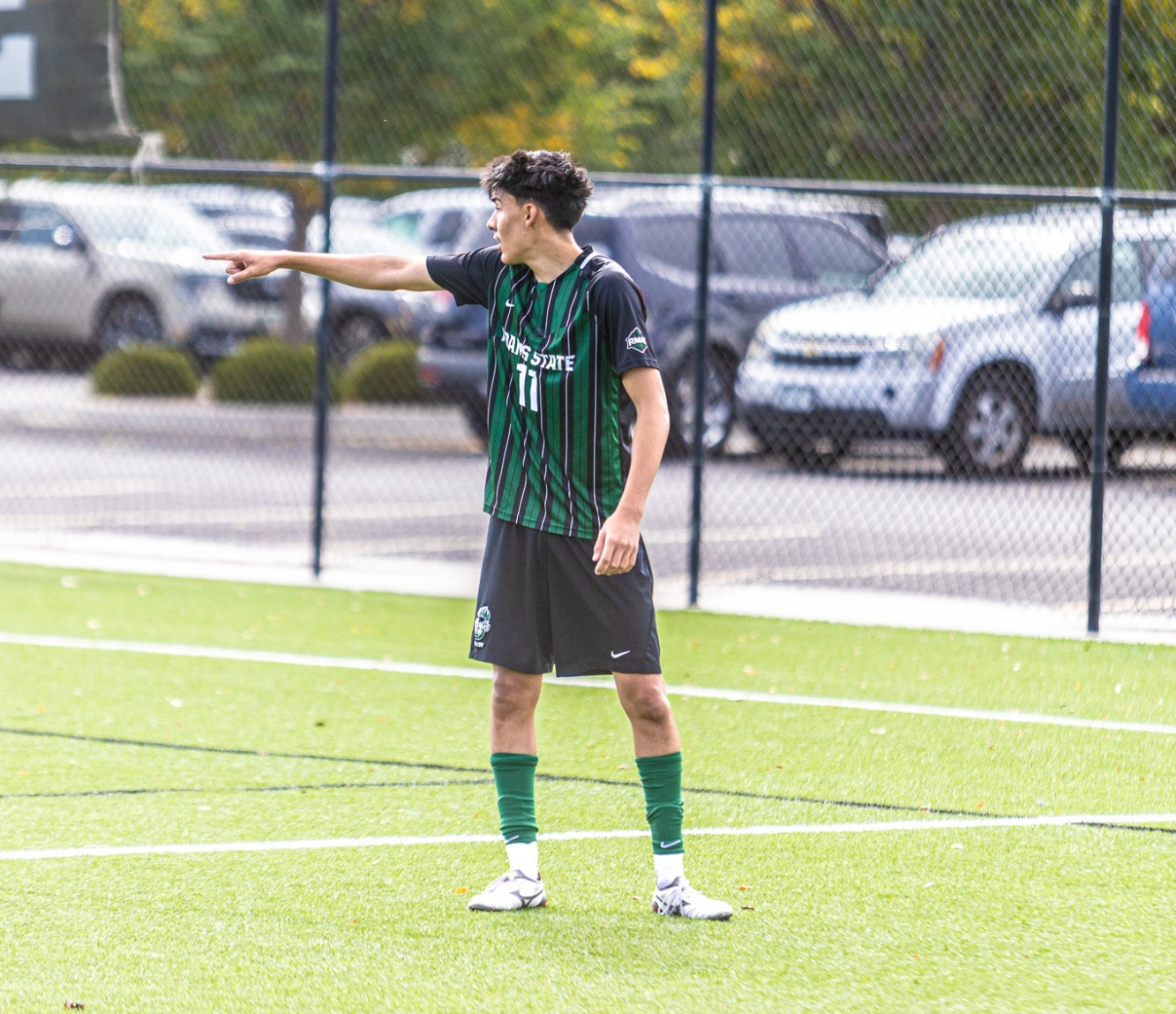 Jonathon Vazquez pointing at Adams State Home Soccer Field