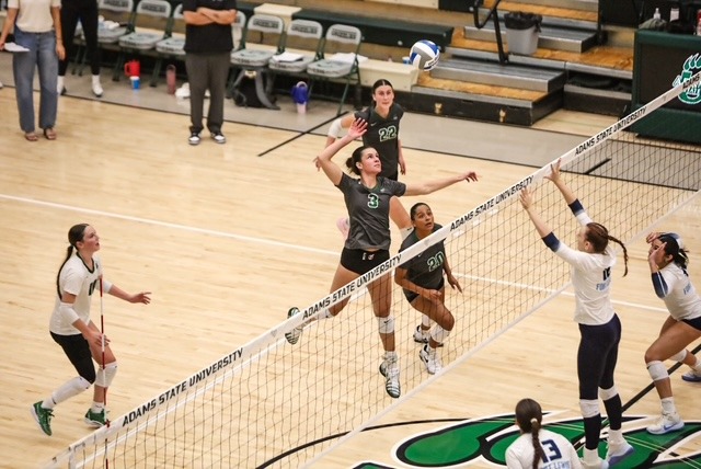#3 Rowan Tribelhorn sets up for a spike in home match against Fort Lewis College