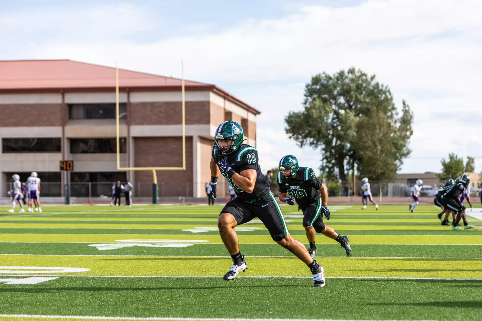 Adams State #10 Zachary Ray and #28 Link Arellanes run up field against Western New Mexico on August 27, 2026 