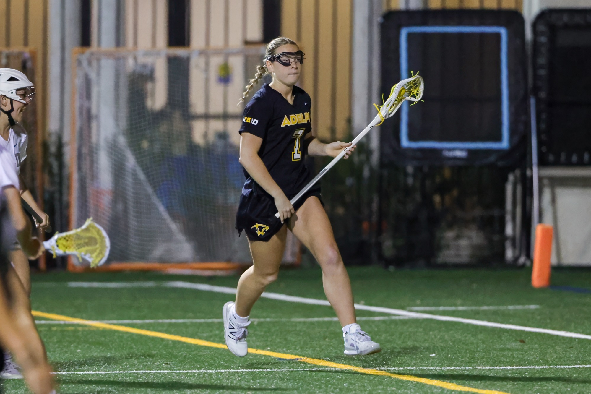 Feb 25, 2025; Winter Park, FL, USA; Adelphi women's lacrosse during a game against Rollins at the Rollins Cahall-Sandspur Field. Mandatory Credit: Mike Watters