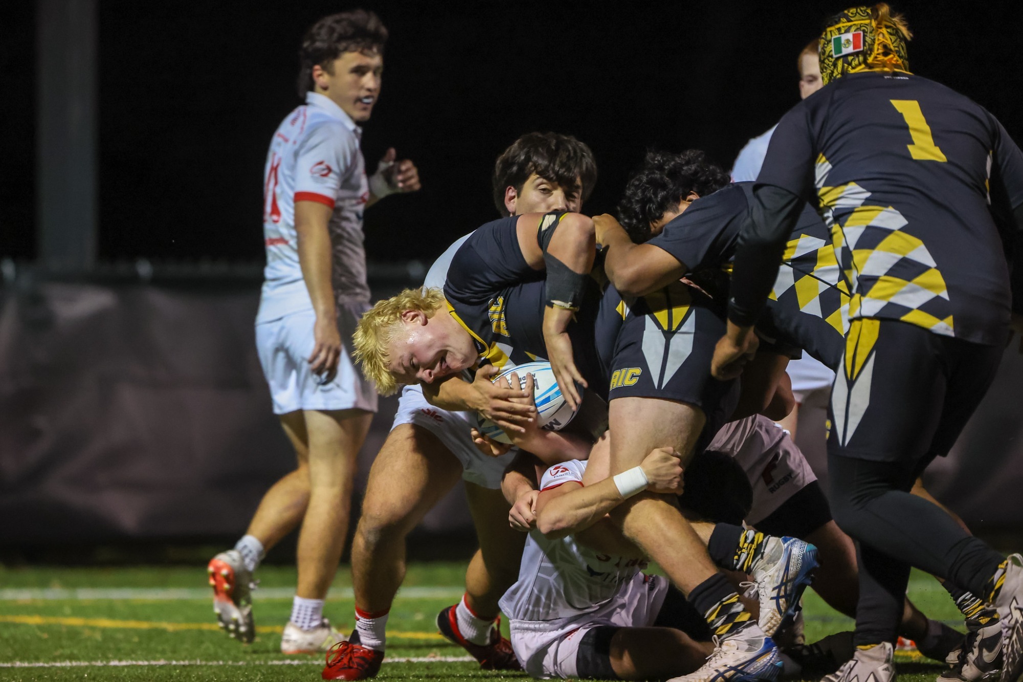 Max Erasmus pushes through the Fairfield defense