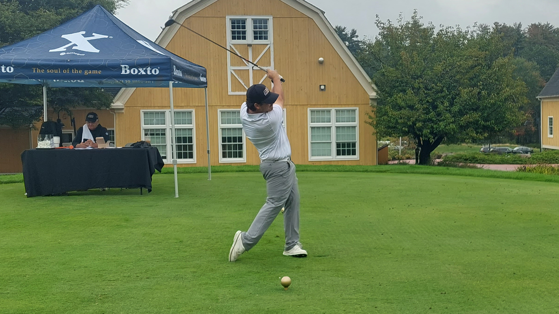 Matt Garrity tees off at the AIC Invitational