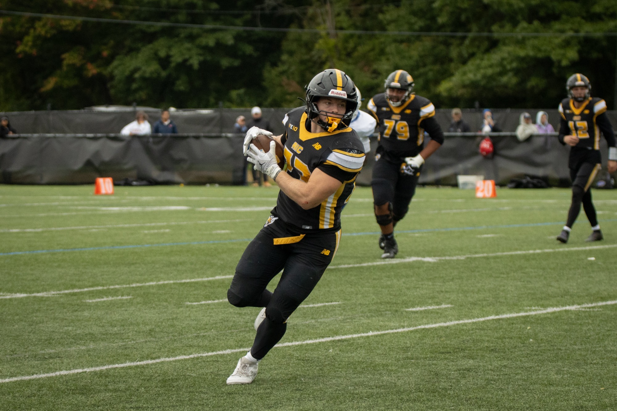 Bo Catherwood runs in the open field