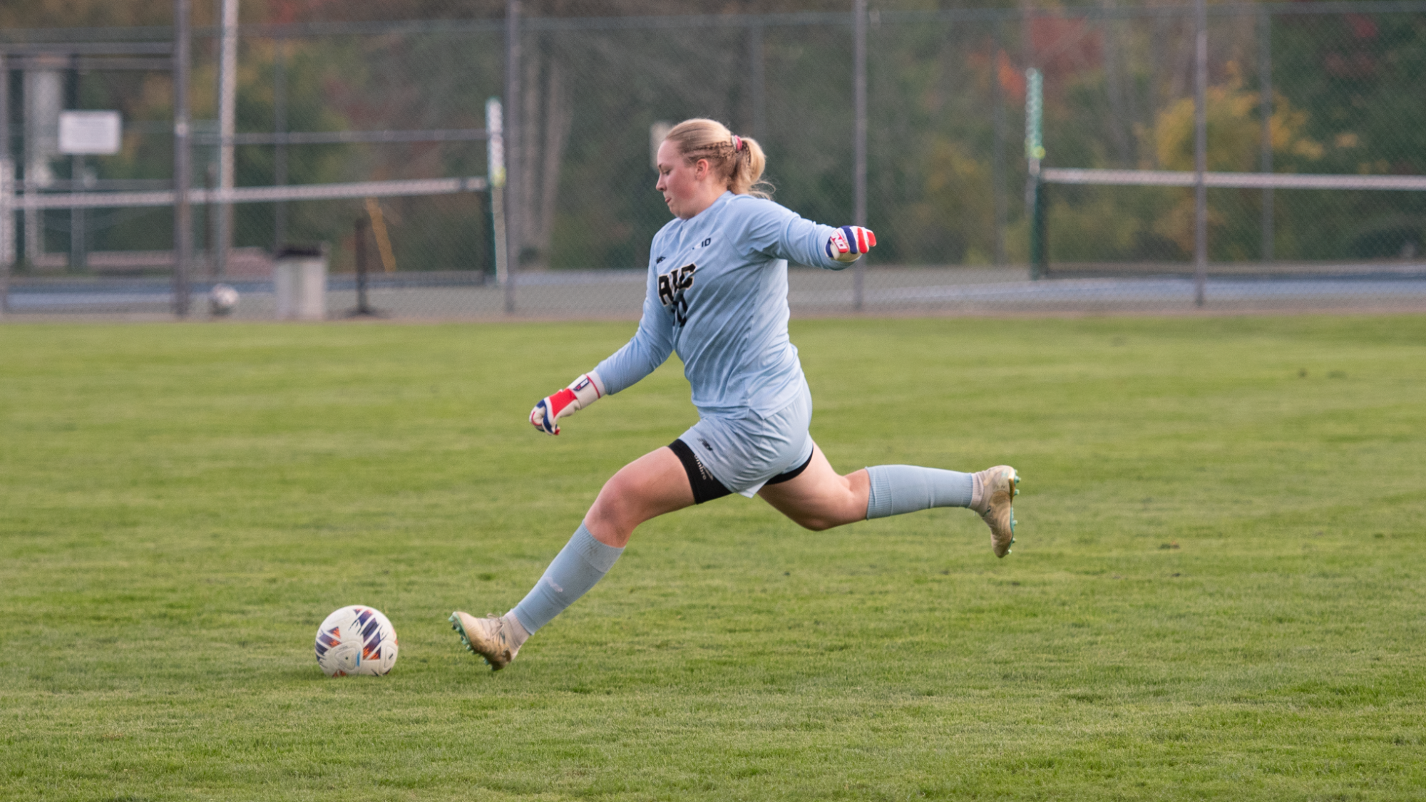 Hedda Haukland kicks the ball at Saint Anselm