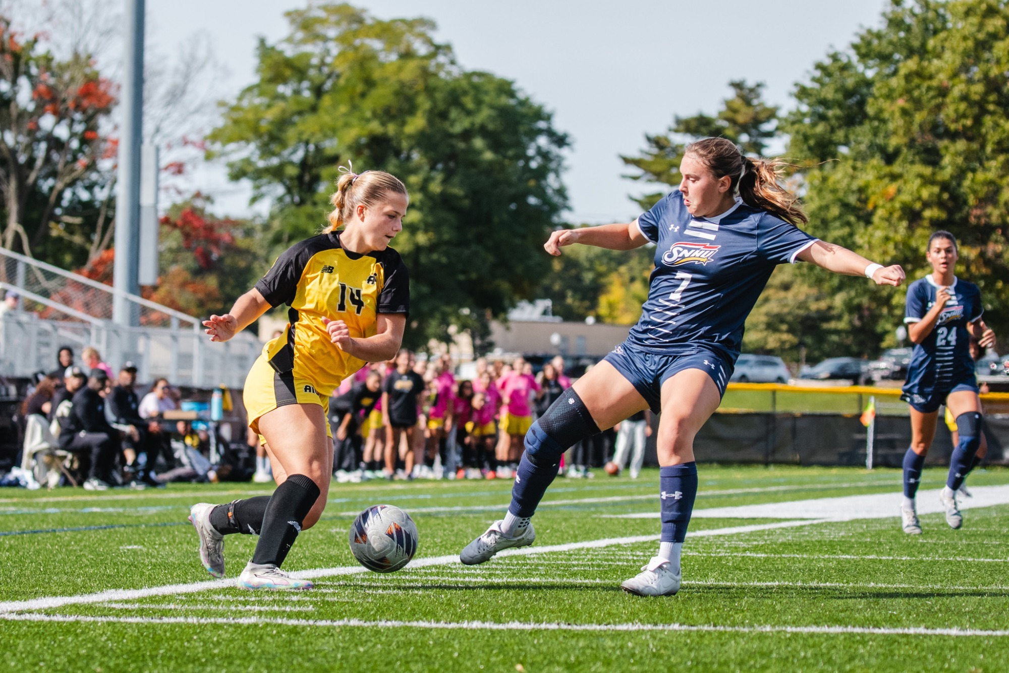 Skylar Schaefer plays the ball against SNHU