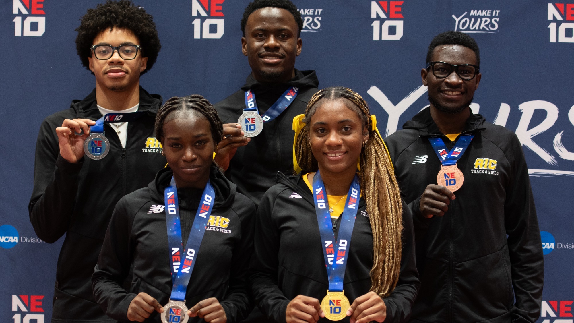Harvey Lys, Romel Plummer, Junior Grant, Hawaye Adam, and Jodiann Ebanks pose with their medals from the 2026 NE10 Indoor Track Championship