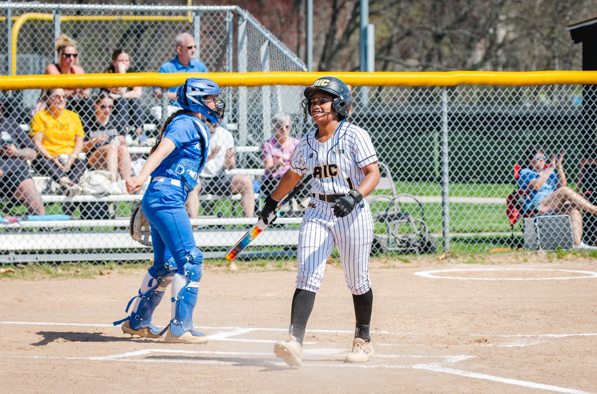 Lauryn Ramalho scores a run against Assumption