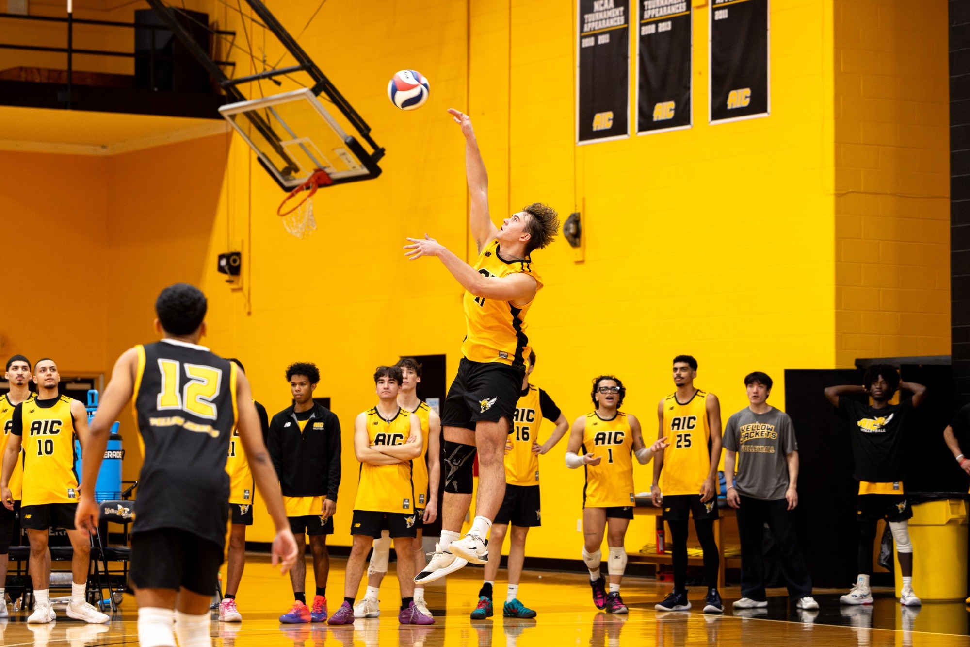 Emil Zhmaidziak serves