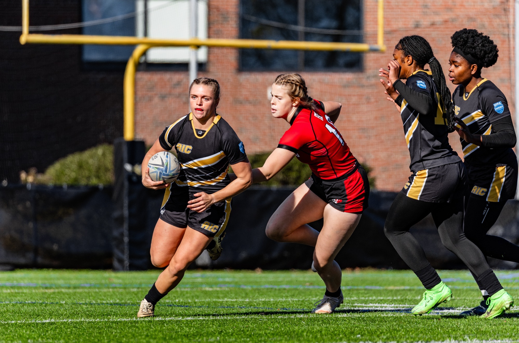 Annekkia Ritter-Truxal carries the ball against Frostburg State
