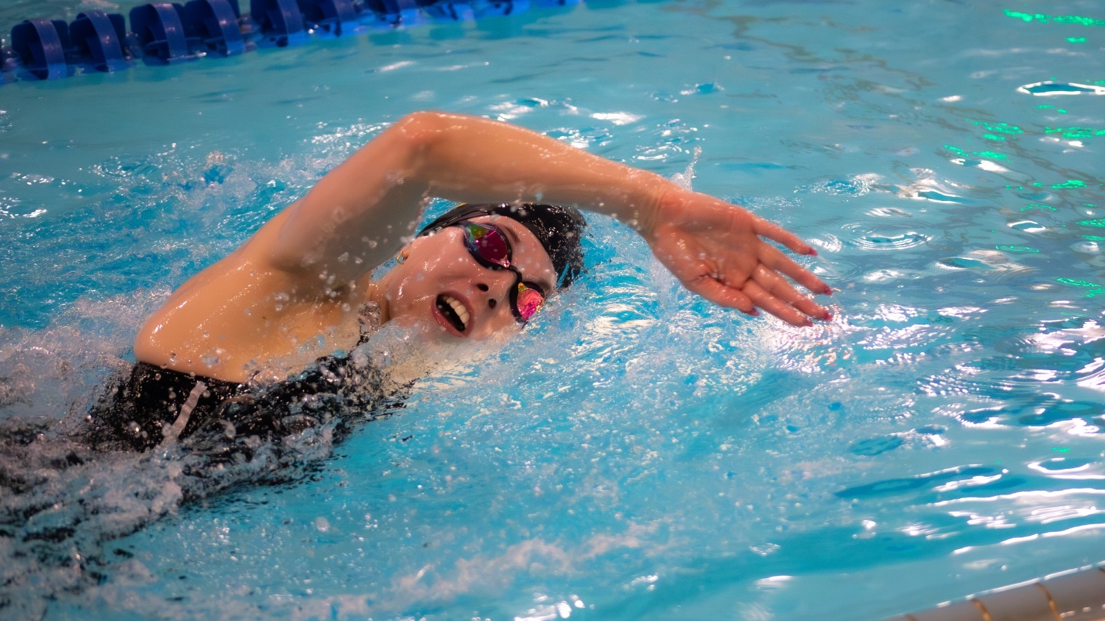 A Nanook swimmer swimming in the freestyle vs. Simon Fraser, 2025-26