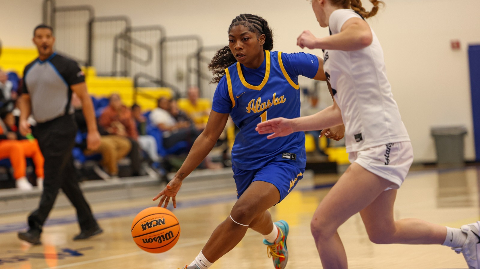 Chozen Horn-Young drives with the ball vs. The Master's in Nov. 2025