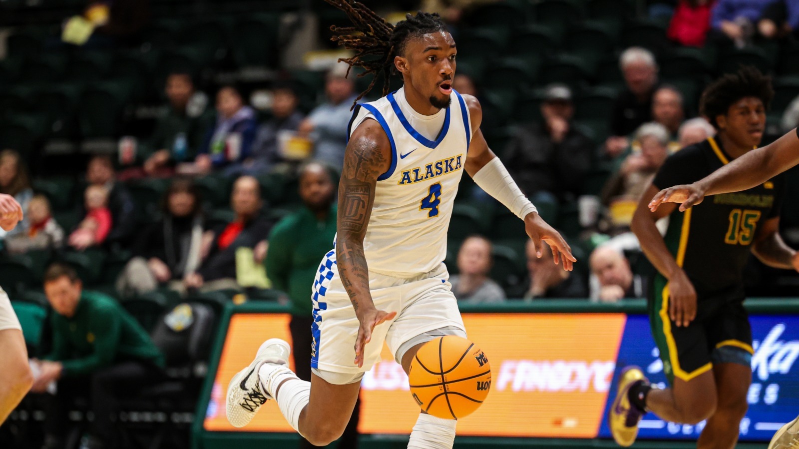 Mike Miller dribbles up the court vs. Cal Poly Humboldt in Nov. 2025