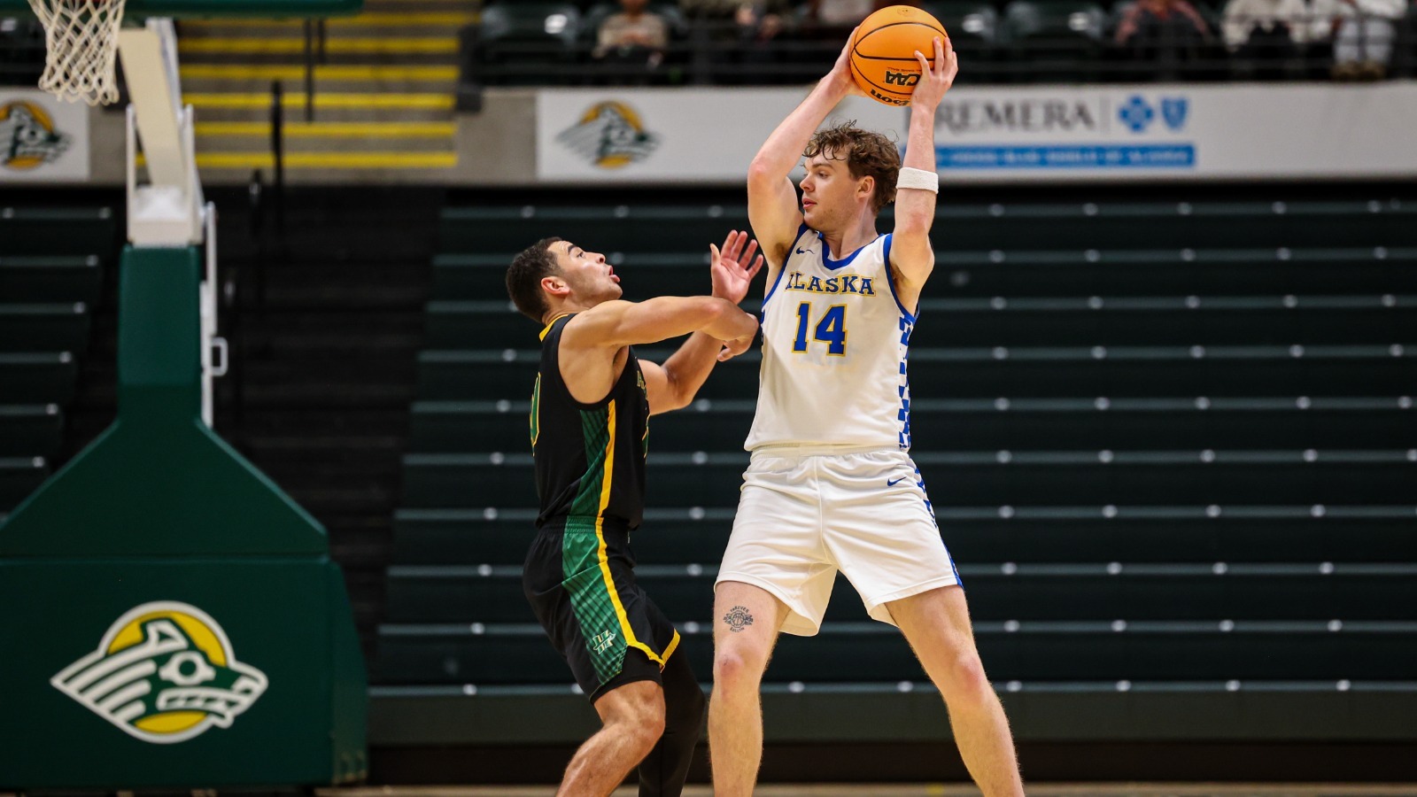 Davis Crilly hold the ball vs. Cal Poly Humboldt at the Sprite Tundra Tip-Off in Nov. 2025