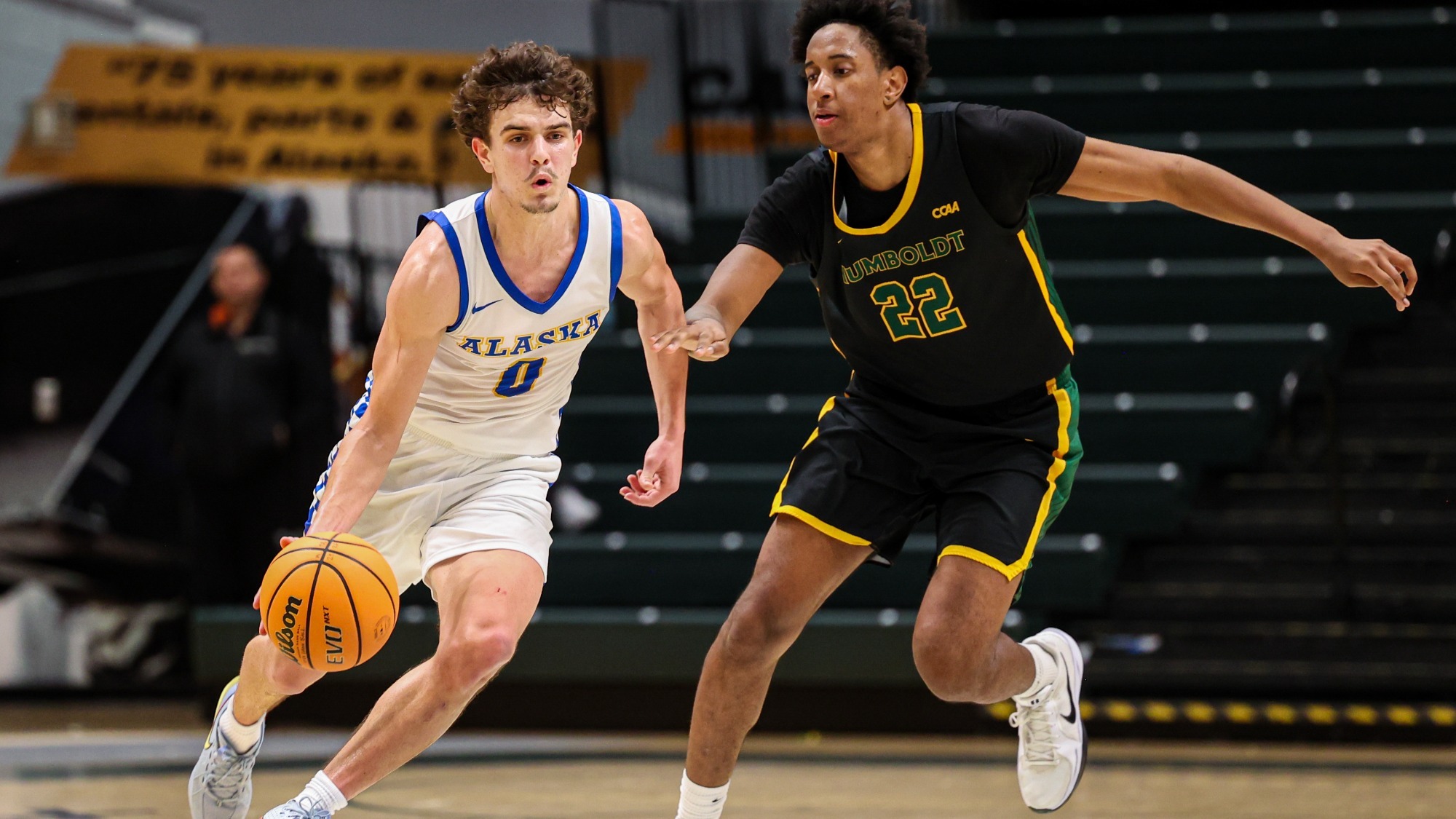 Tariq Weiser drives with the ball vs. Cal Poly Humboldt on Nov. 29, 2025
