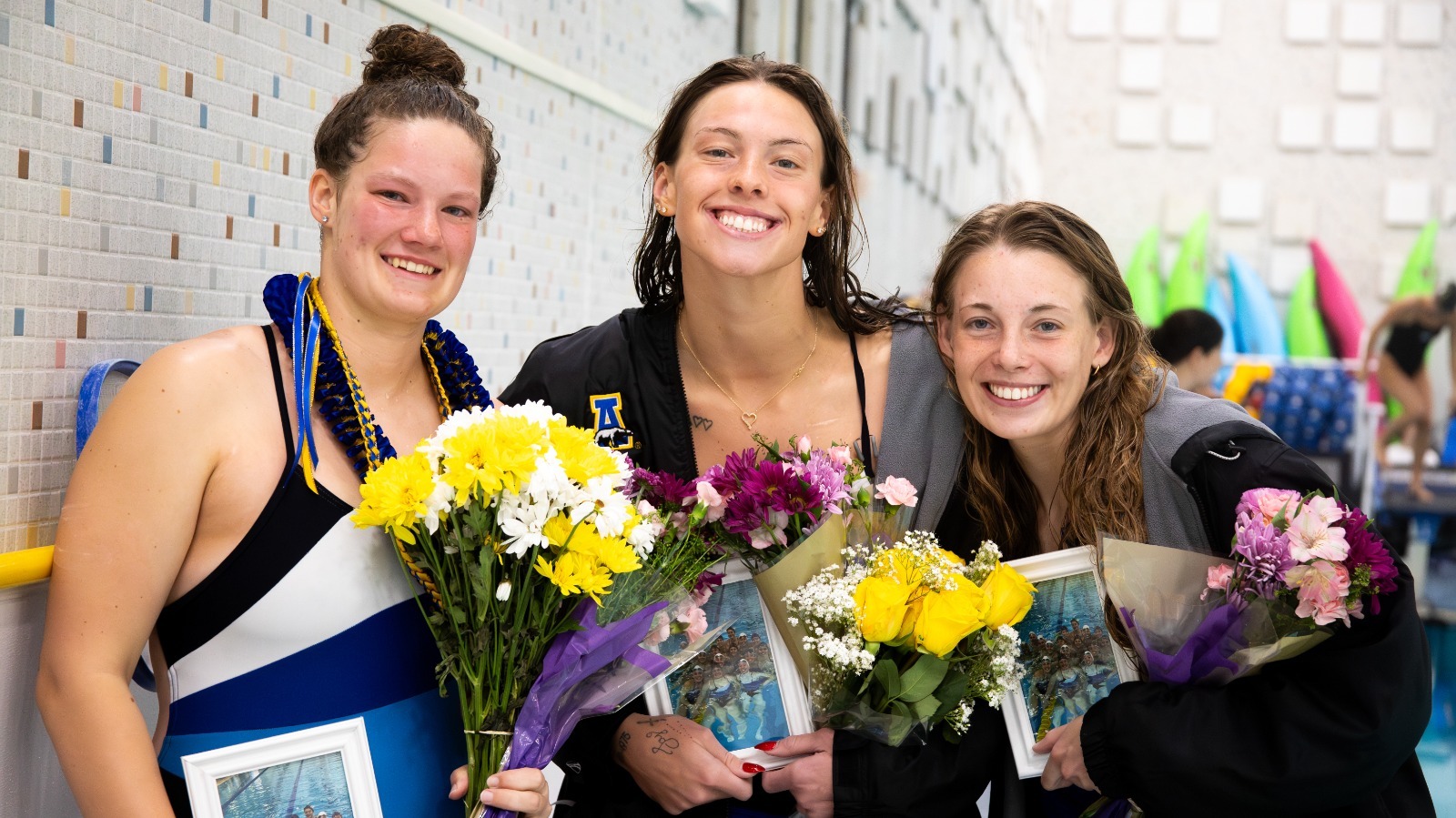 Kaidence Sampsel, McKenzie Fazio and Ali Pecore celebrate Senior Day on Jan. 17, 2026