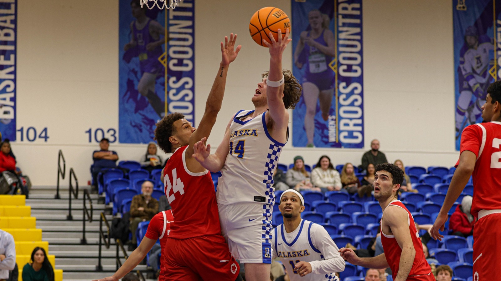 Davis Crilly goes up for a layup vs. Simon Fraser on Jan. 3, 2026