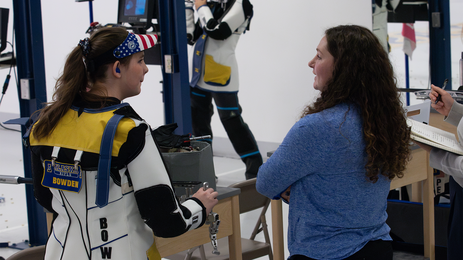 Marley Bowden (left) talks with head coach Randi Loudin (right)