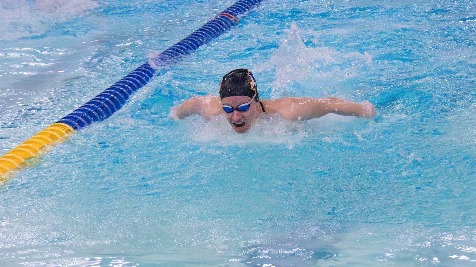 Cosima Schmiedel swims in the butterfly vs. Westmont, Jan. 2026