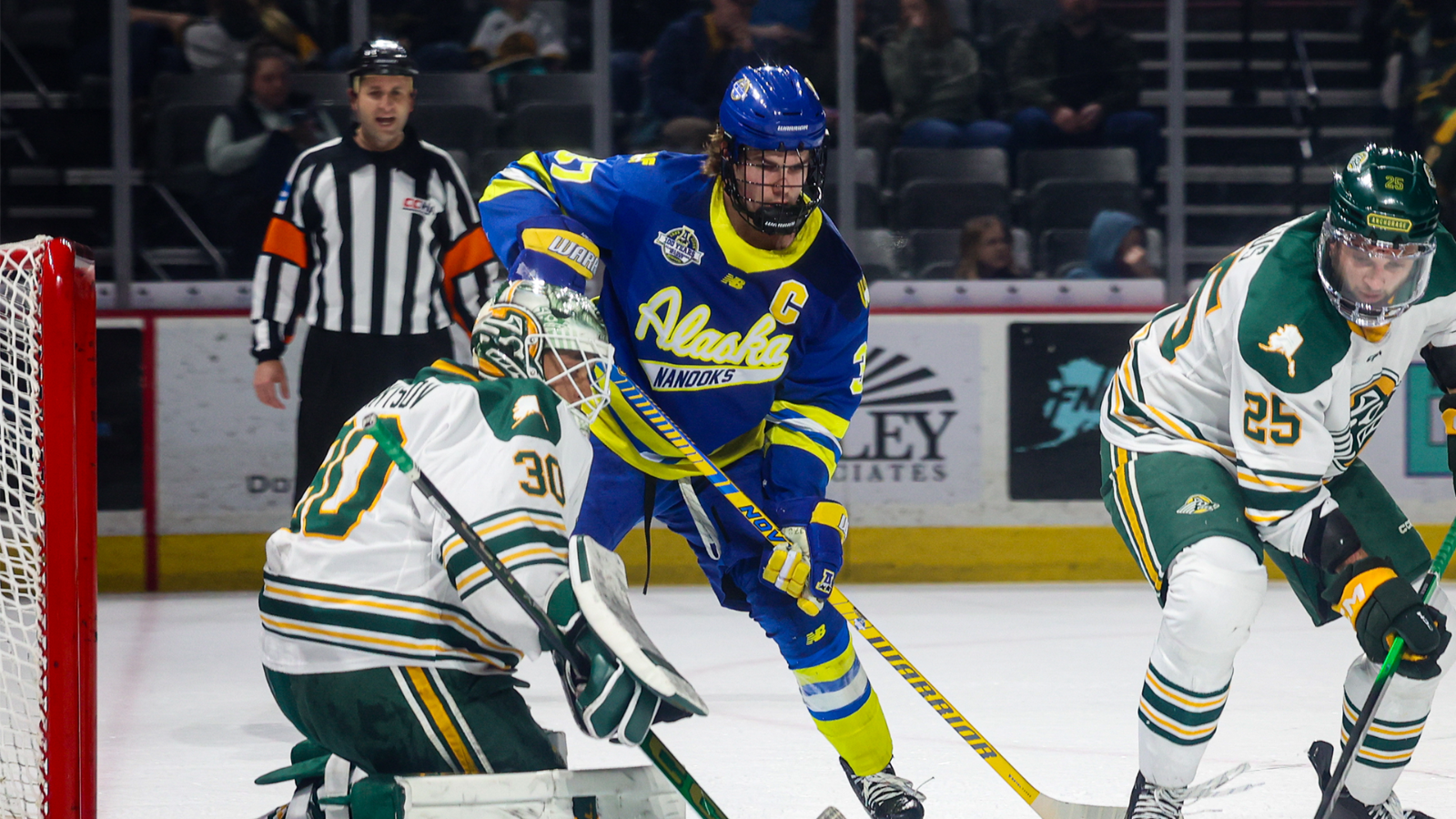 Chase Dafoe near the crease at UAA
