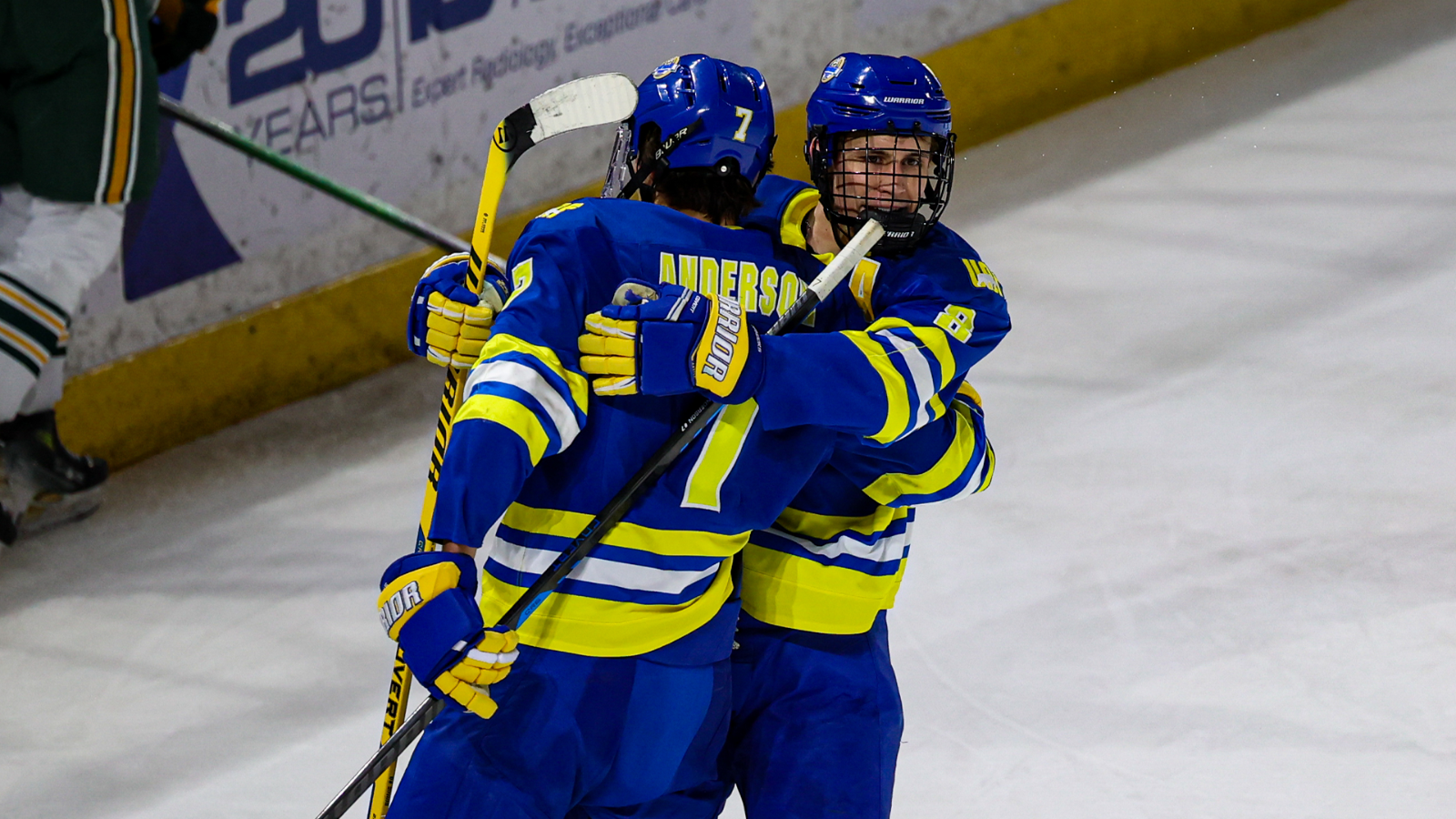 Braden Birnie celebrates with Jackson Anderson after a goal at UAA