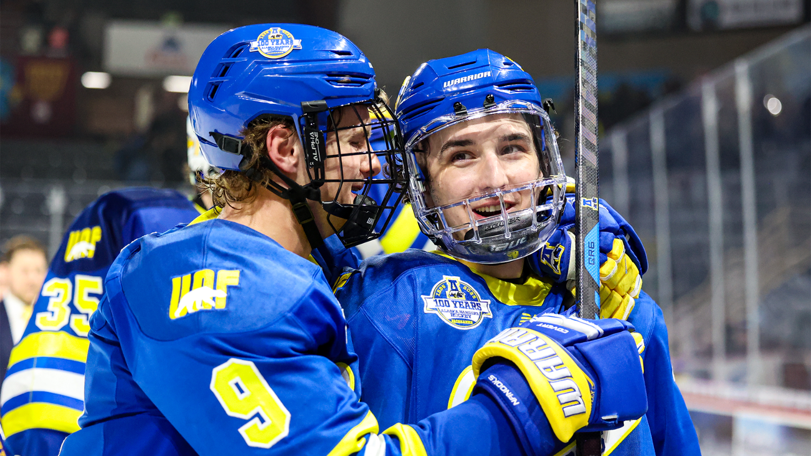 Dean Spak and Michael Citara celebrate after a Nanooks win at UAA
