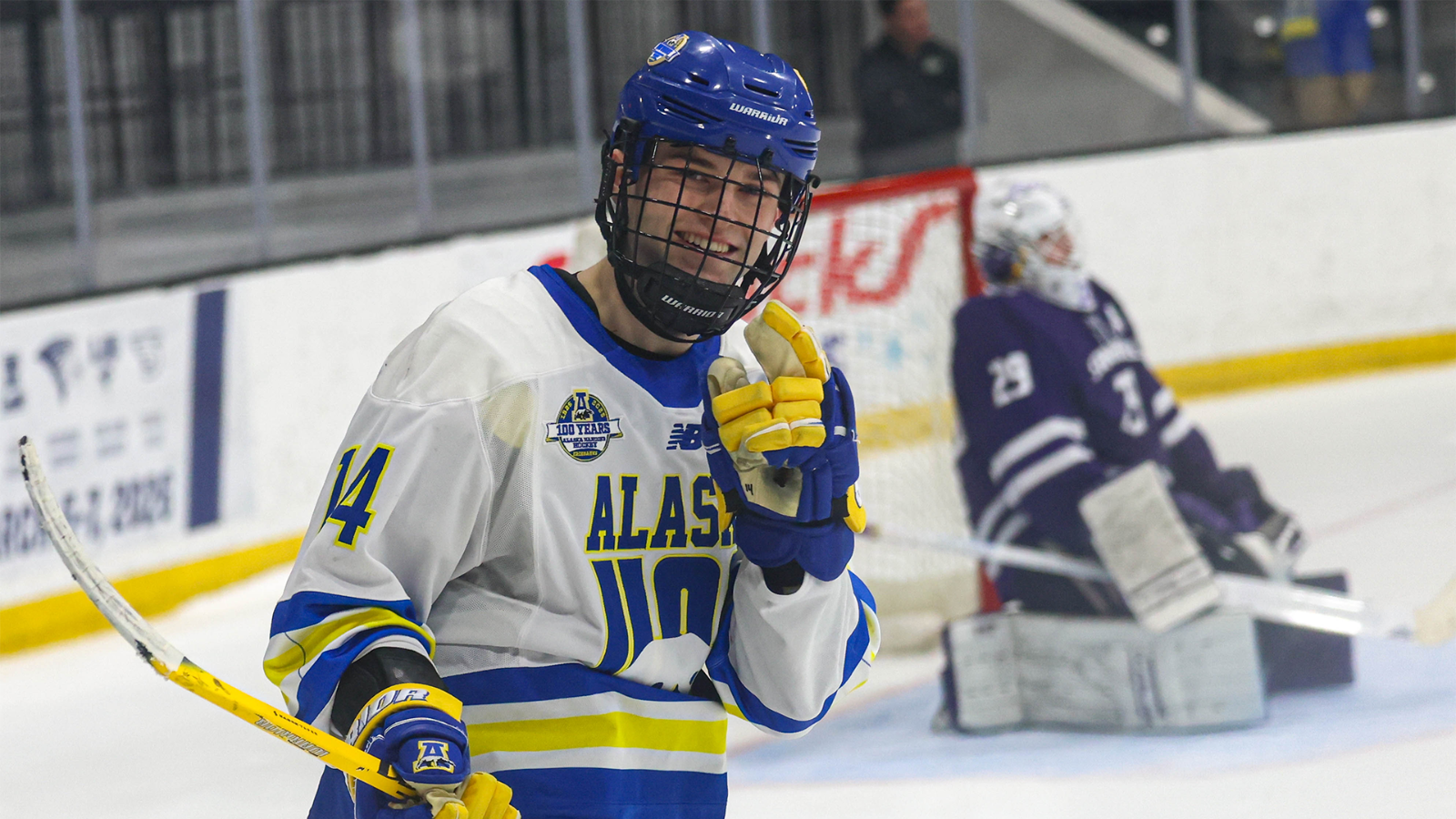 Tommy Cronin smiles and points after the game-winner in the shootout in St. Louis